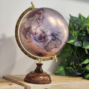AROUND THE WORLD GLOBE ROSE GOLD