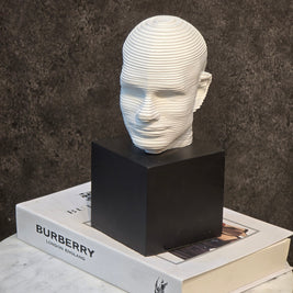 NOVEL FACE FIGURINE